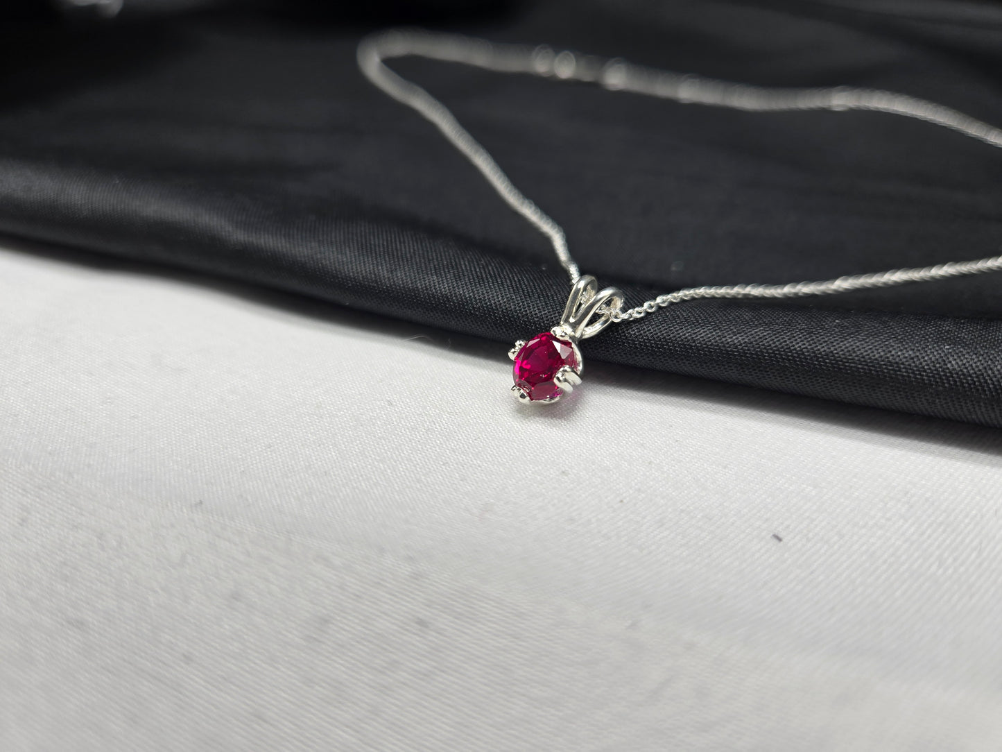 Twin Prong Created Oval Ruby and Silver Necklace