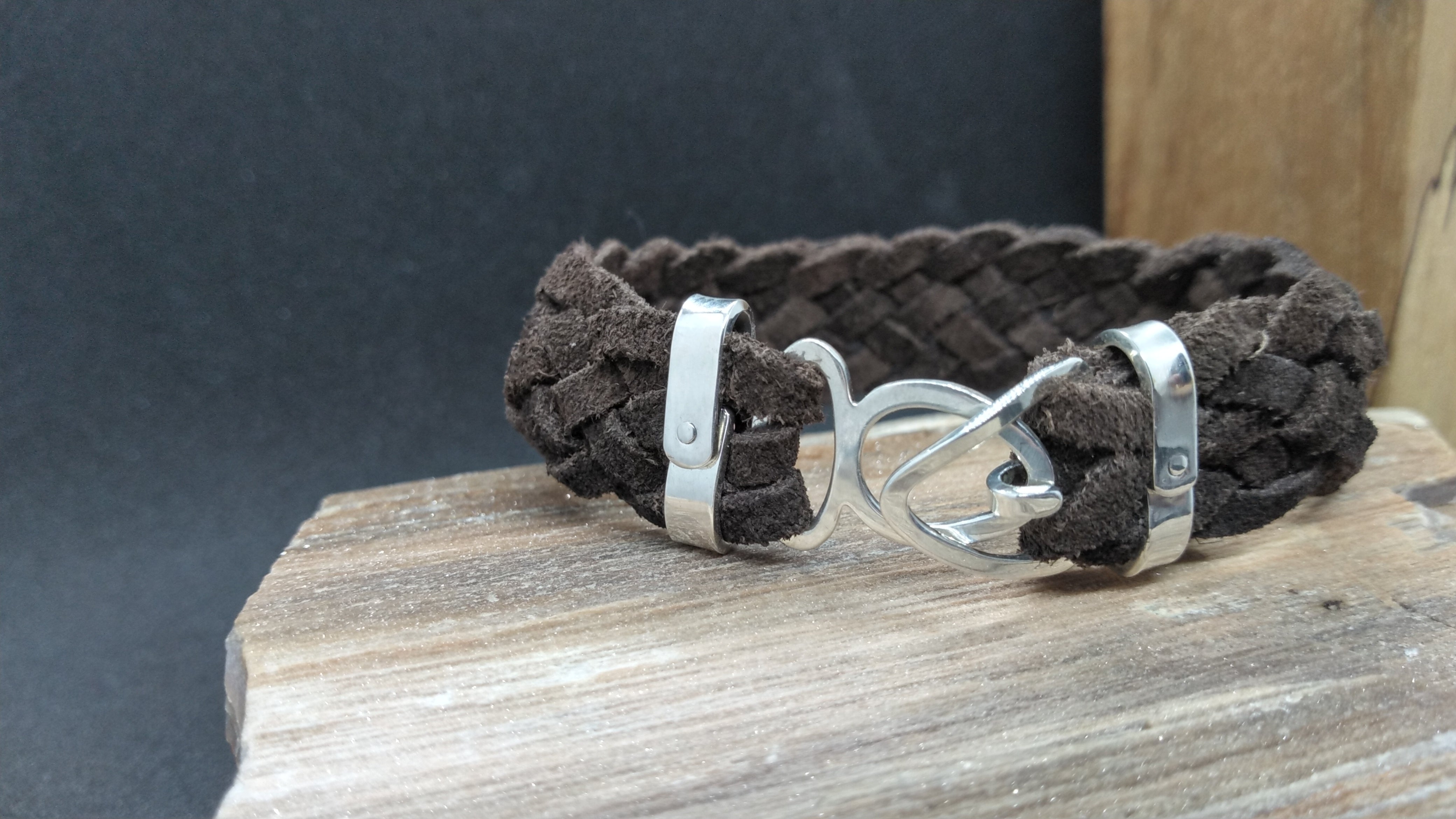 Rockertype braided leather bracelet with silver outlet clasp